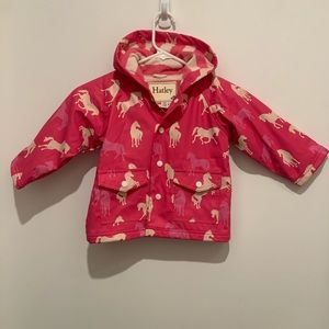 Hatley girls rain coat. Pink with white and pink horses. Size 18-24 months